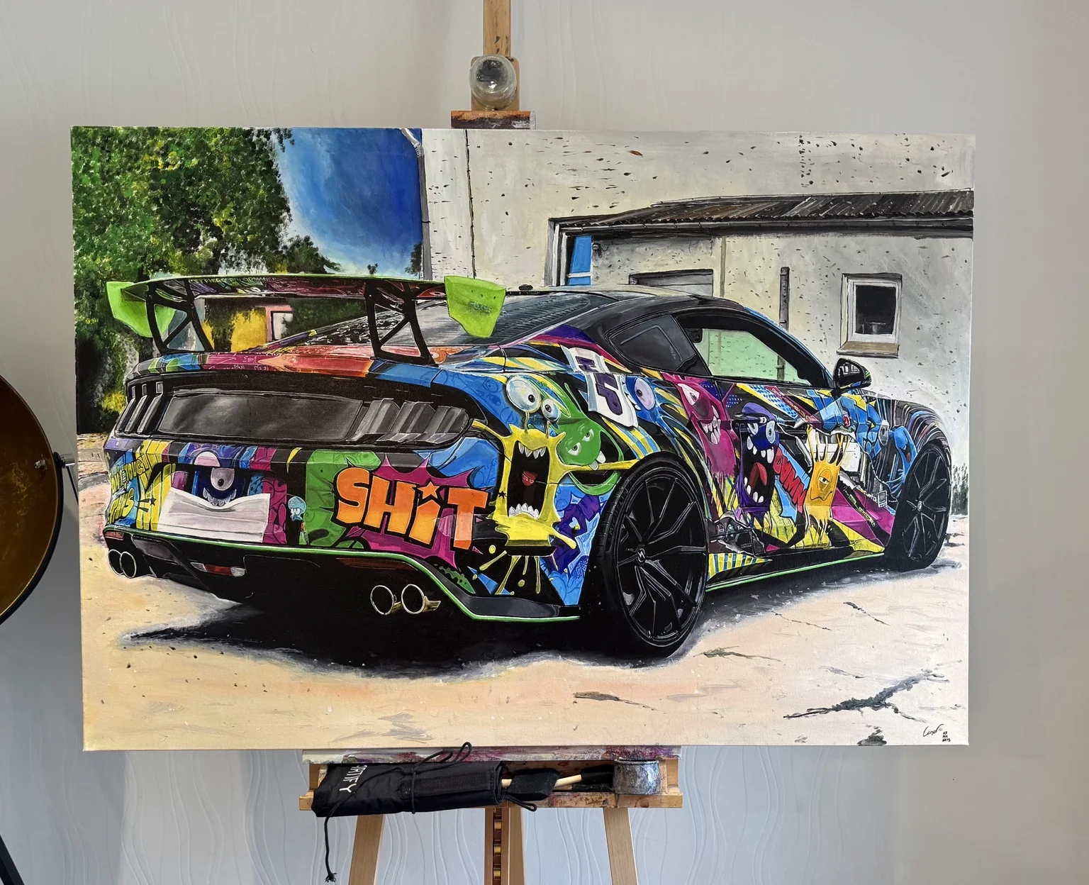 The Maniac, a colourful graffiti-wrapped Ford Mustang painting